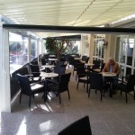 Terrace enclosure top and side awnings.