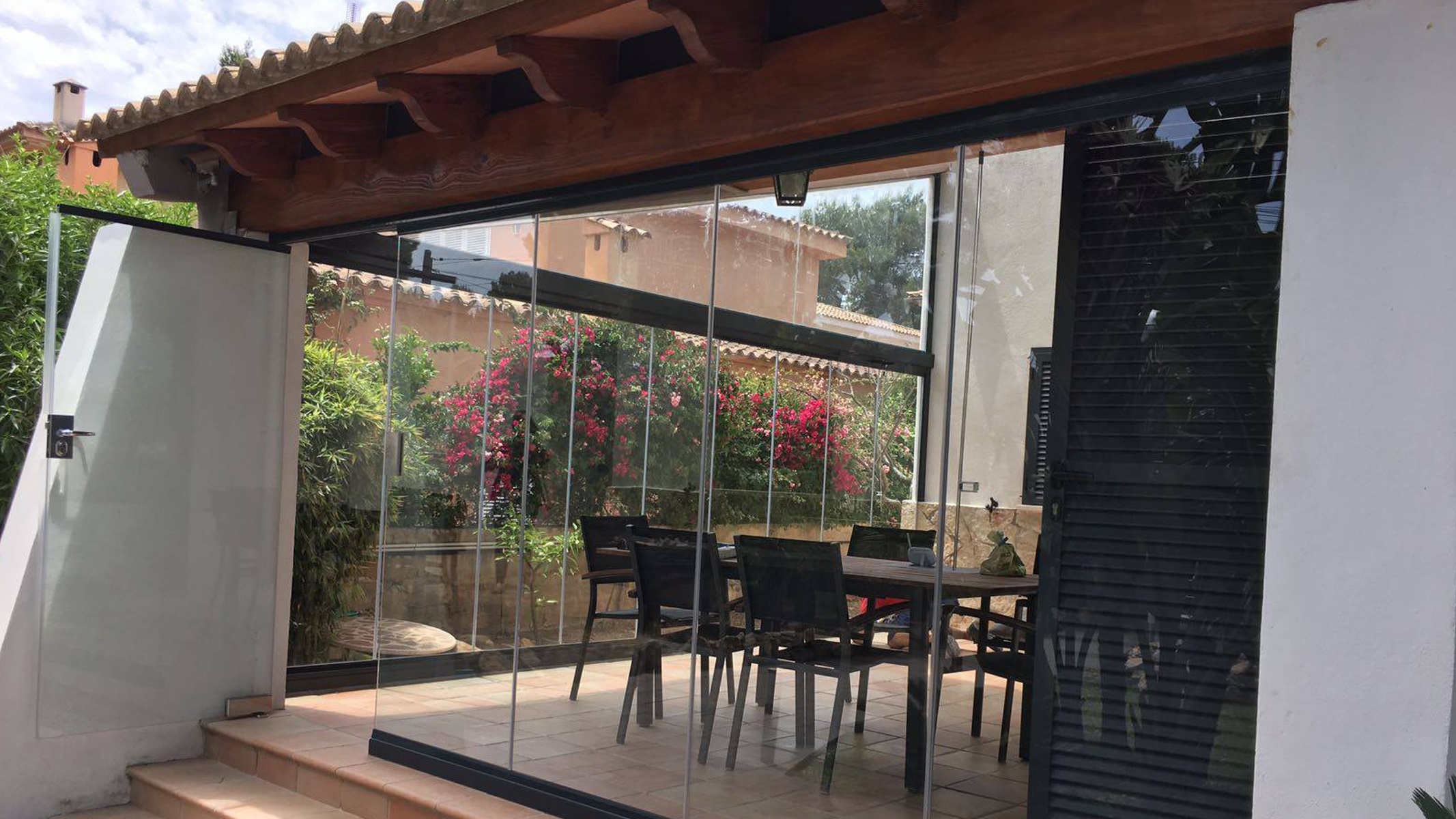 Instalación de cortinas de cristal en Mallorca | Alumiglass